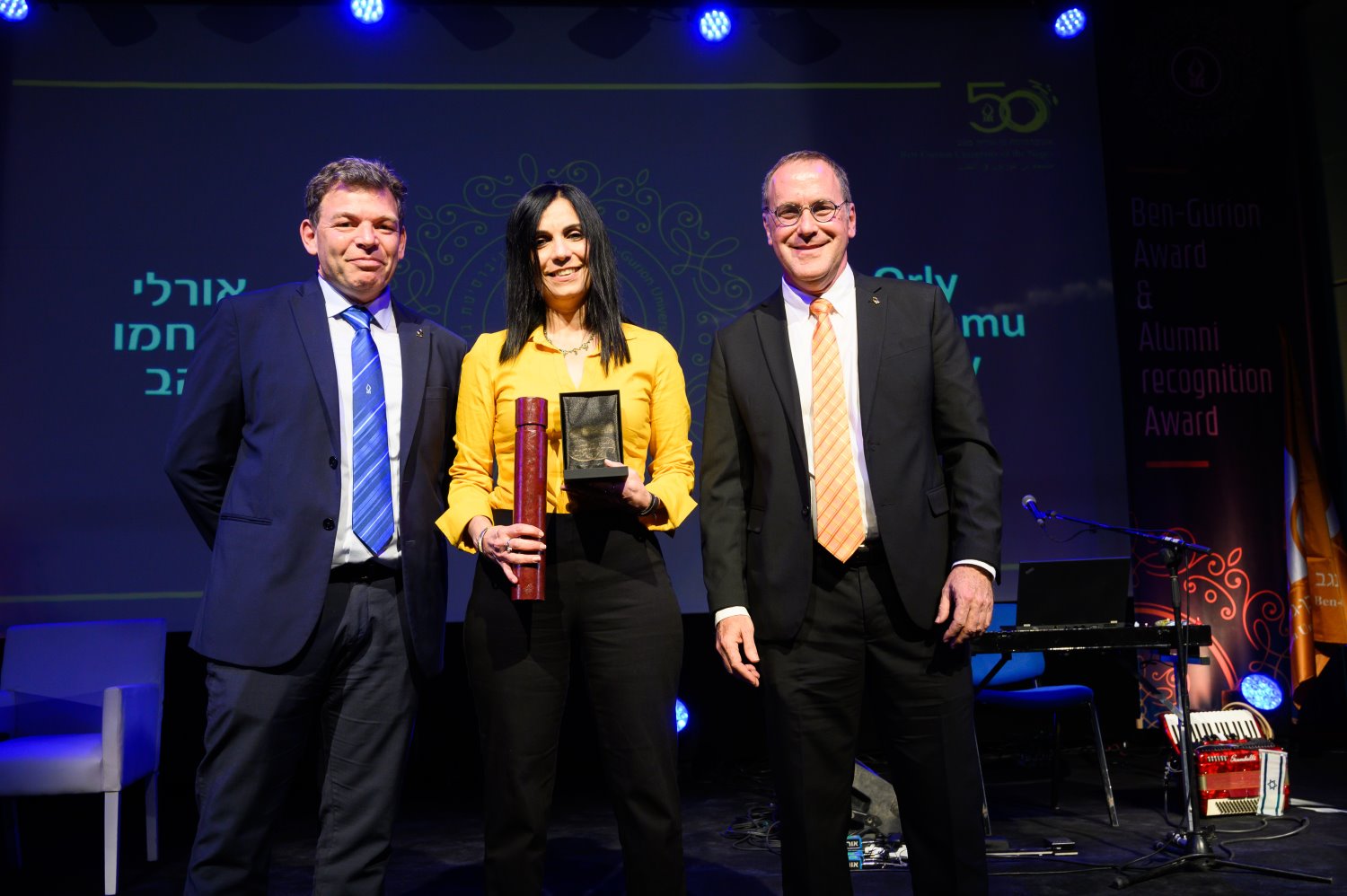 אורלי בן-חמו להב נשאה דברים בשם מקבלי אות הבוגר צילום: דני מכליס 