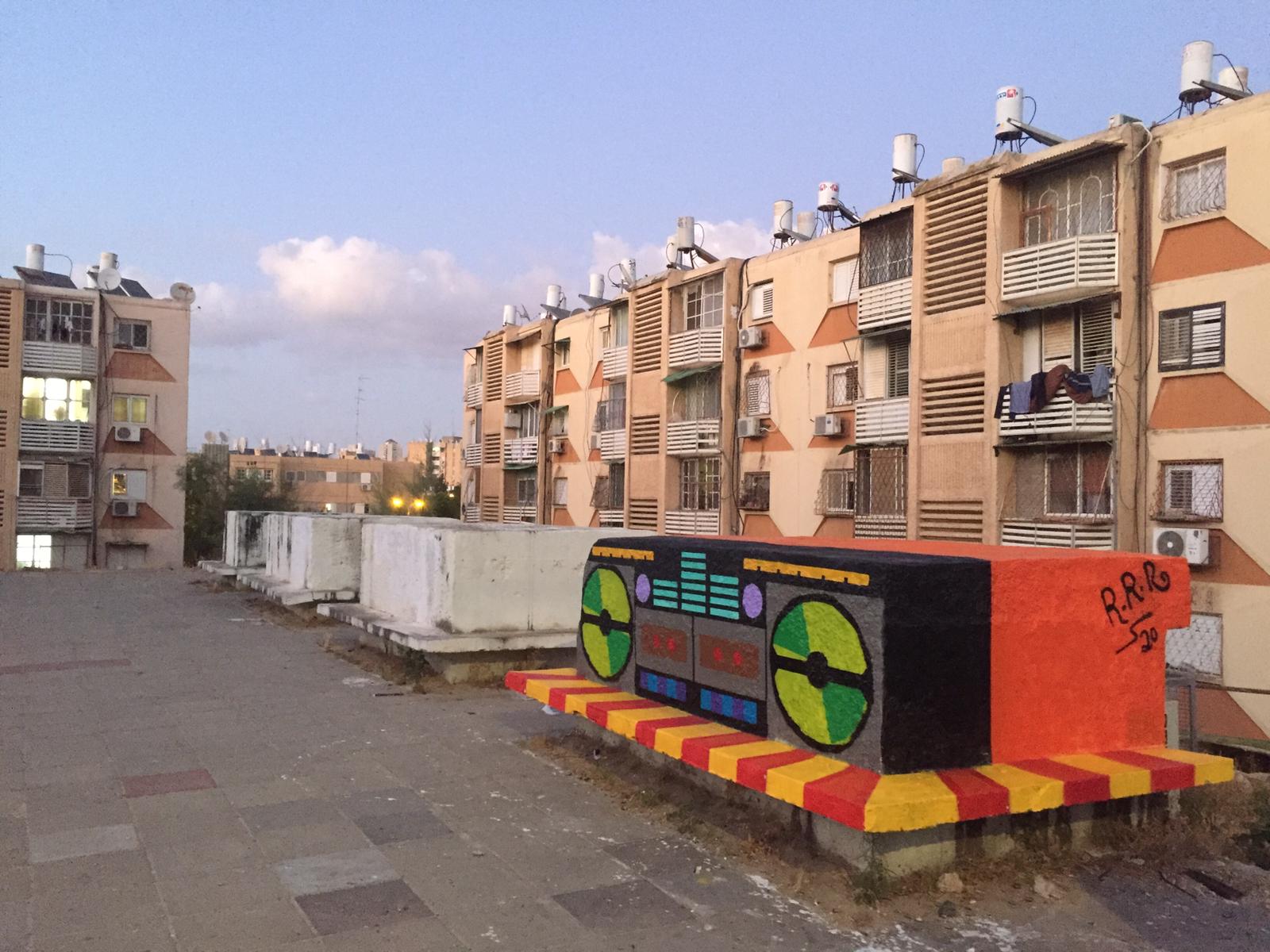 גרפיטי סיטי שכונה יא'. קרדיט לאמן הגרפיטי אריאל לב