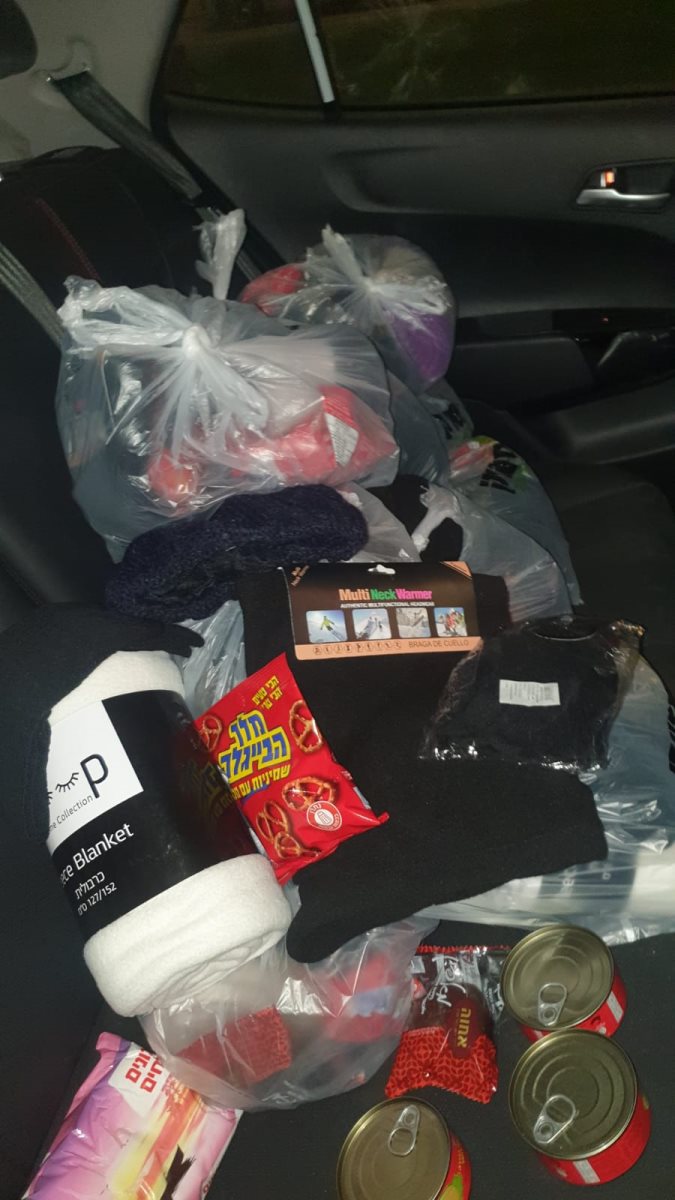 חלק מהתרומות שאספו לפק"ל החורף עבור דיירי הרחוב, צילום פרטי