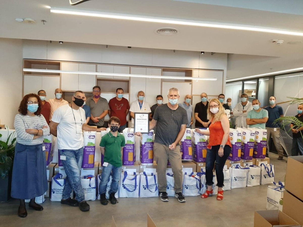 עמותת שניר בשיתוף רוזמן מחלקת סלי מזון, צילום מיכל ניר