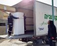 נגב אקולוגיה מעבירים ציוד לדירה החדשה של מארק - קרדיט יחצ