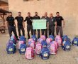 מלאכים במדים: סוהרי שב"ס רכשו עשרות תיקי בית ספר למשפחות נזקקות